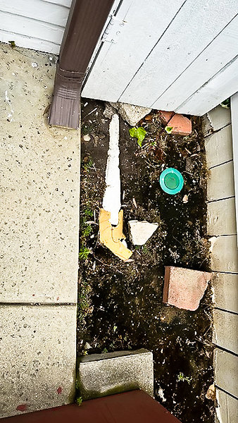 West Neigh-4 - Busted pipe; roof downspout